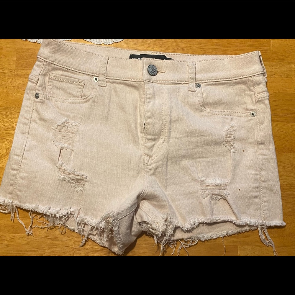 Light pink high wasted distressed shorts